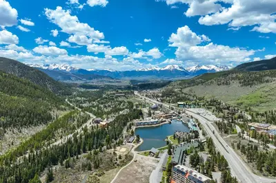 an aerial view of a town and a river and mountains at Gateway Studio - Pool, Hot Tub, Walk to Slopes in Keystone