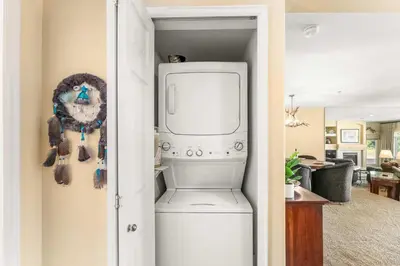a laundry room with a washer and dryer at 2 Bedroom Hot Tub Fireplace Walk to Lake Dillon in Frisco