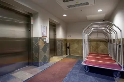 a metal cage in a hallway of a building at Ski-In Ski-Out Zephyr 1 Bedroom Condo 2204 in Winter Park