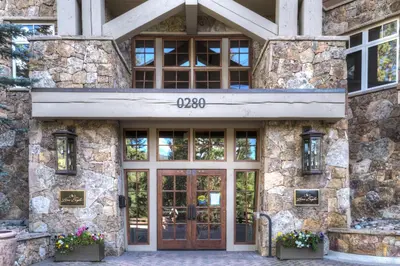 a stone building with a door with the number on it at Lone Eagle 3052 in Keystone