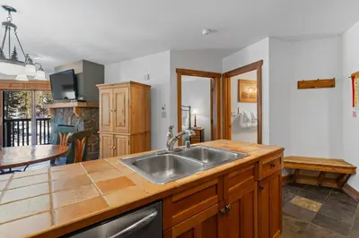 a kitchen with a sink and a counter top at Red Hawk Lodge 2267 in Keystone