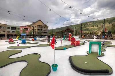 a playground with a bunch of miniature play areas at Expedition Station 8574 in Keystone