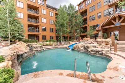 a swimming pool in the middle of a building at Springs 8887 in Keystone