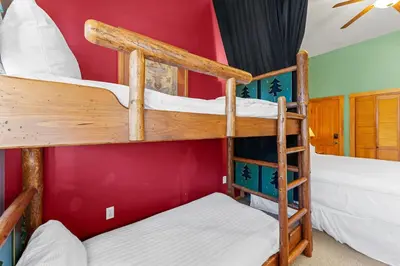 a bunk bed in a room with two bunk beds at Arap Ldg 8101 in Keystone