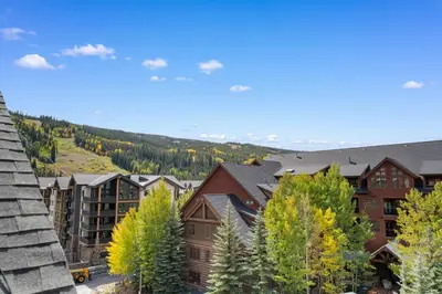 arial view of a resort with trees and buildings at Red Hawk Lodge 2313 in Keystone