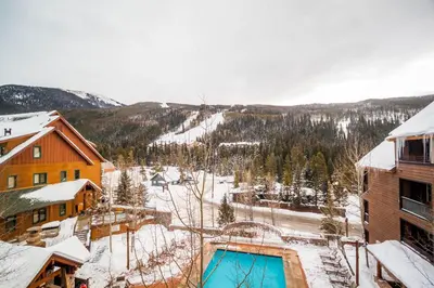 a view of a ski resort in the snow at Dakota Lodge 8512 in Keystone