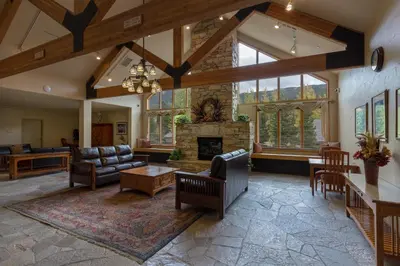 a living room with couches and a fireplace at Gateway 5097 in Keystone