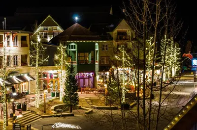 a group of houses decorated with christmas lights at Red Hawk Lodge 2312 in Keystone