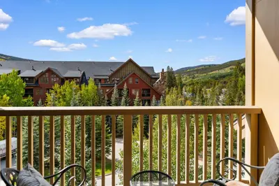 a view from the balcony of a house at Red Hawk Lodge 2312 in Keystone