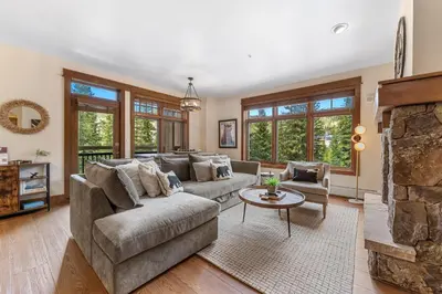 a living room with a couch and a fireplace at Lone Eagle 3021 in Keystone