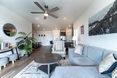 a living room with a couch and a table at Sail Lofts 303 in Dillon