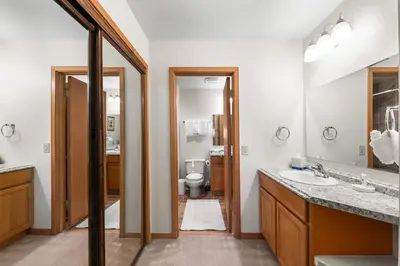 a bathroom with a sink and a toilet at Ski Run 412 in Keystone