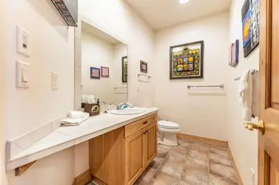 a bathroom with a sink and a toilet at 94 Ryan Gulch Road in Silverthorne