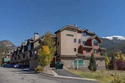 a row of buildings on a street with a mountain at Gateway 5098 in Keystone
