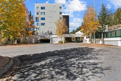 an empty street in front of a building at Saints John 2539 in Keystone