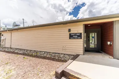a building with a sign on the side of it at Lakeshore 4 in Keystone