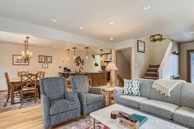 a living room with a couch and chairs at Gold Dust 660A in Frisco