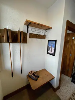 a room with baseball bats hanging on a wall at 2 BR Basecamp Bliss at Kicking Horse Near Ski Hill in Granby