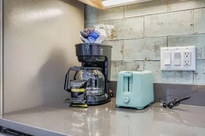 a coffee maker sitting on top of a kitchen counter at 2903 Riverbank Lodge condo in Keystone