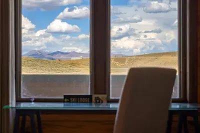 a window with a view of a desert view at Rocky Mountain Retreat in Granby