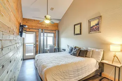 a bedroom with a bed and a ceiling fan at Rocky Mountain Retreat in Granby