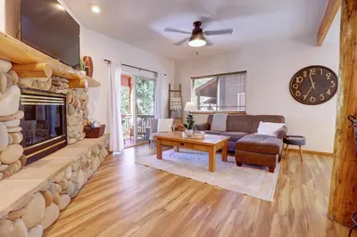 a living room with a couch and a fireplace at 122 Lookout Ridge townhouse in Dillon