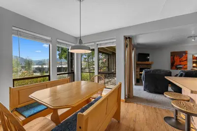 a living room with a table and a couch at Lake Cliffe 108 Building F in Dillon