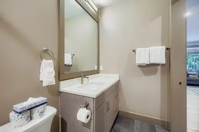 a bathroom with a sink and a mirror at 1820 The Seasons condo in Keystone