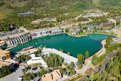 an aerial view of the lake at the resort at 1820 The Seasons condo in Keystone