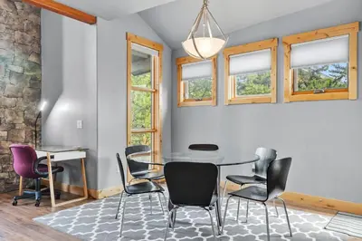a dining room with a table and chairs at Mountain Getaway Deck Spacious Kitchen in Silverthorne