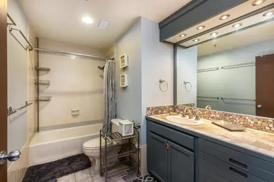a bathroom with a sink and a toilet and a shower at 2795 Slopeside condo in Keystone