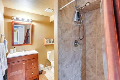 a bathroom with a shower and a sink at Spacious Family Home with Deck and Yard in Littleton! in Littleton