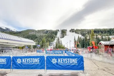 a ski resort with a ski slope in the background at Gateway 5059 in Keystone