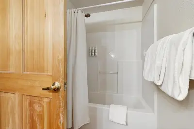 a bathroom with a shower with a shower curtain at Gateway 5059 in Keystone