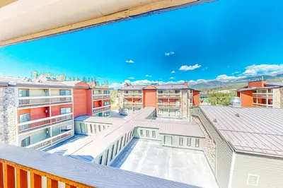 a view from the balcony of a apartment with a basketball court at Cozy Corner in Winter Park