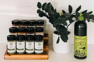 a bottle of wine next to a plant and a vase at Loft Retreat - King Bed&Balcony - Pet-Friendly 30 in Denver