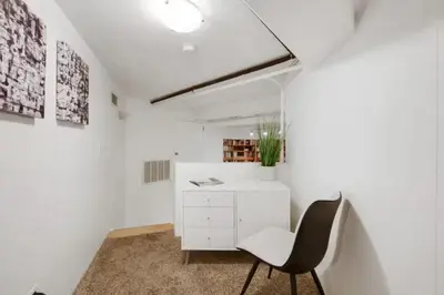 a room with a white desk and a chair at Loft Retreat - King Bed&Balcony - Pet-Friendly 30 in Denver
