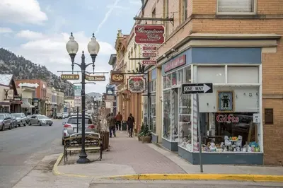 a city street with shops and a street light on the sidewalk at Studio at St Marys Glacier in Idaho Springs