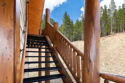 a wooden staircase on the side of a house at Studio at St Marys Glacier in Idaho Springs