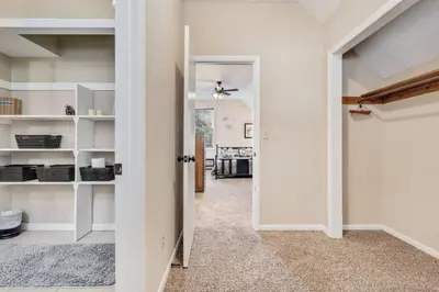 a hallway with a door leading into a room at King of the Mountain. Private Hot Tub. Pets allowe in Idaho Springs