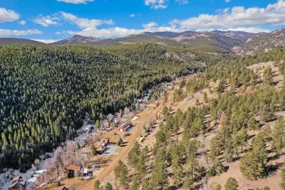an aerial view of a valley with trees at Cabin by North Clear Creek. Private Hot Tub. Pets in Black Hawk