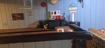 a room with a counter and a counter top in a room at Tiki Bar in The Basement in Arvada