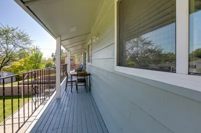 a porch with a table and a window at Stress-Free Commuting! Extended Stay in Littleton in Littleton