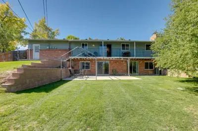 an empty yard in front of a brick house at Stress-Free Commuting! Extended Stay in Littleton in Littleton