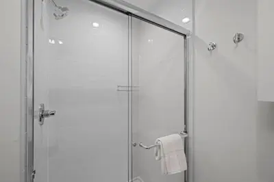 a shower stall with a glass door in a bathroom at 301 W Meadow Mile #3 in Fraser