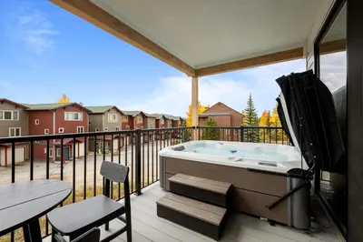 a hot tub on the balcony of a house at 301 W Meadow Mile #3 in Fraser
