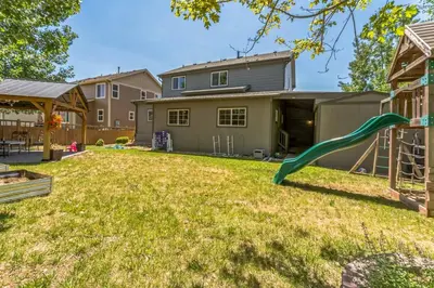 a yard with a playground with a slide at Free Night! Movies, Games & BBQ|25 mins>DT Denver in Brighton