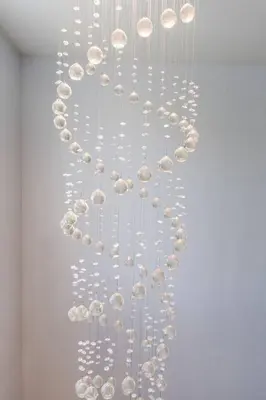 a bunch of shells hanging on a wall at Free Night! Movies, Games & BBQ|25 mins>DT Denver in Brighton