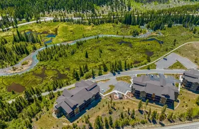 an aerial view of a large estate with a building at 1 bedroom apartment free electric charger Keystone in Keystone