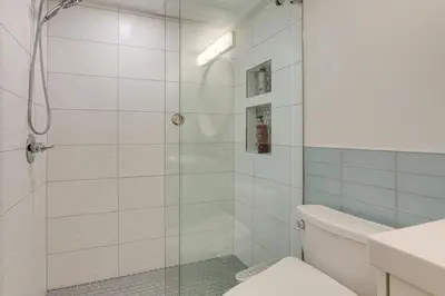 a bathroom with a shower and a toilet at Mountain Side D277 in Frisco
